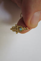 gold opal hamsa necklace